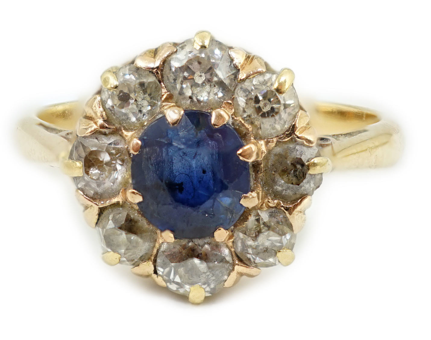 An 18ct gold, sapphire and diamond cluster ring